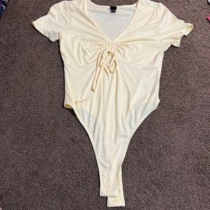 Size medium, it’s a light yellow and a bodysuit